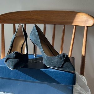 High heeled black suede shoes